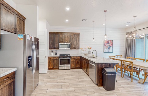 Ivins House | Enchanting townhome with pool, hot tub, fire pit, games, & great balcony views