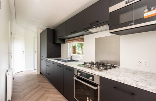 Lieren House | Enjoy a relaxing holiday in a modern Cozy Chalet in the most beautiful location in the Veluwe.