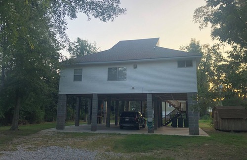 Mandeville House | Enjoy a stay at this quaint 3 bedroom 2 bath home near downtown Mandeville.