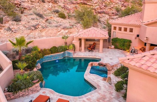 Mountain Park Ranch House | Enjoy breathtaking views of the mountainside throughout this hillside estate.