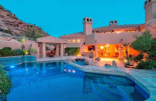 Mountain Park Ranch House | Enjoy breathtaking views of the mountainside throughout this hillside estate.