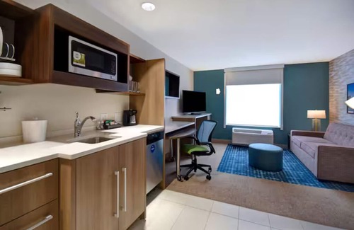 Wichita Hotel | Enjoy Homey Comfort w/In-Room Kitchen at Wichita Downtown Location