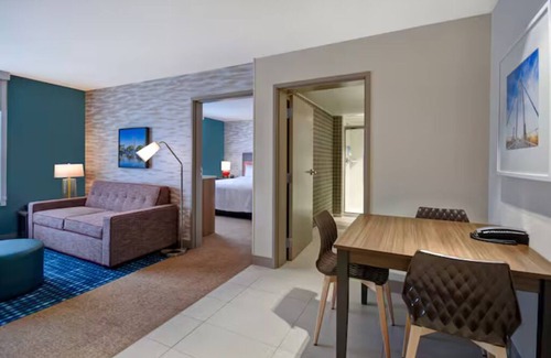 Wichita Hotel | Enjoy Homey Comfort w/In-Room Kitchen at Wichita Downtown Location