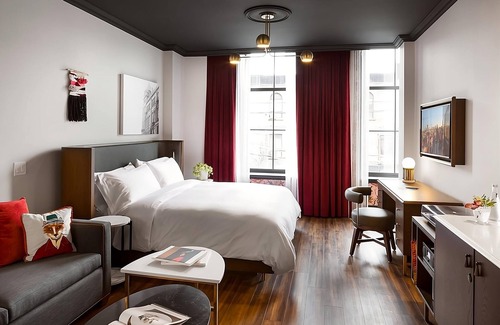 Riverside Hotel | Enjoy Skyline Views from the Rooftop Bar! 4 Comfortable Units, Coffeehouse