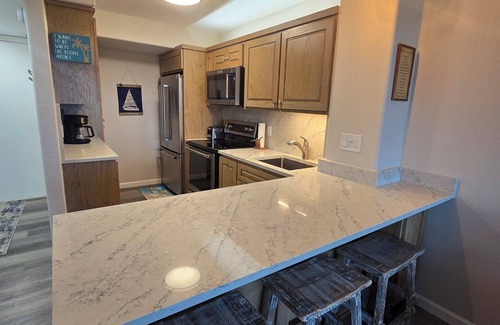 South Padre Island Condo | Enjoy the beautiful water views of the Gulf & Laguna Madre from your rental!