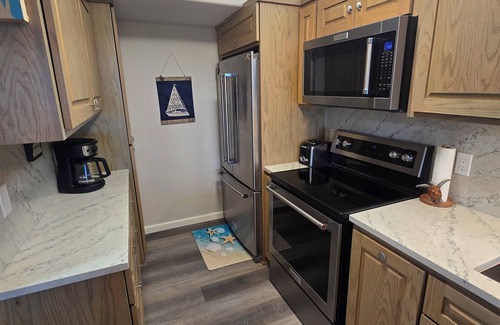 South Padre Island Condo | Enjoy the beautiful water views of the Gulf & Laguna Madre from your rental!