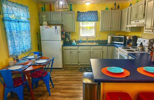 Colington Cottage | Enjoy the Cool Breeze! Fireplace, 2 Decks! Soundside, Dogs OK, Bay Dr, Hammock