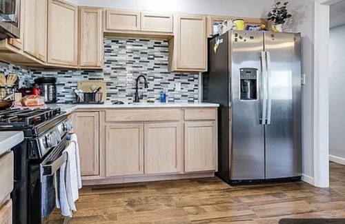 San Angelo House | Enjoy this beautiful wood floor and more!