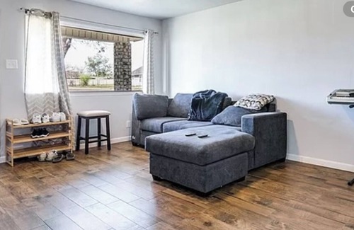 San Angelo House | Enjoy this beautiful wood floor and more!