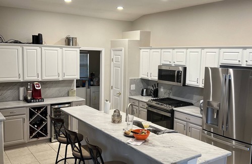 Tarpon Springs House | Enjoy this Exclusive - 4 Bedroom FL Home with Privacy Fence and Private Pool