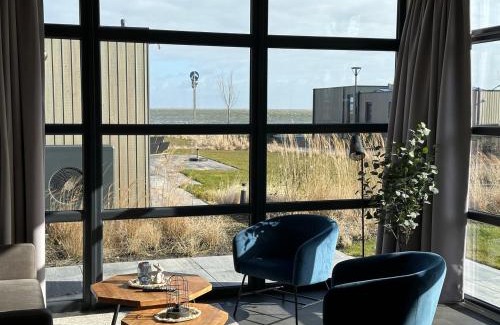 Enkhuizen House | Enkhuizer Strand Chalet Windrose mit Zaun Haus Nr 225