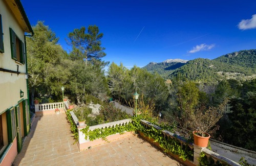 Lluc House | ES VINT I NOU - Beautiful house with great terrace amidst the mountains.
