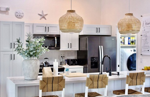 Safety Harbor Club House | Escape to CASA PALMA HIDEAWAY! 4BD/3BA, Pool, Outdoor Kitchen, boat slip & More!