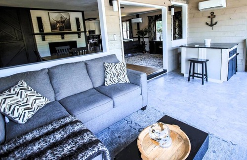 Cave Spring House | Escape to Tranquil Waters, where comfort meets calm. Enjoy serene river views and waterfront access, inviting spaces, and the perfect backdrop for rest, romance, or family fun. Boat Rental and Fishing Charters available anytime of the year.