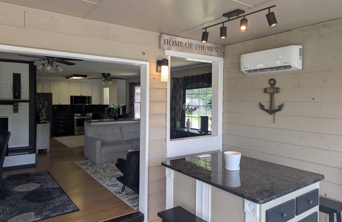 Cave Spring House | Escape to Tranquil Waters, where comfort meets calm. Enjoy serene river views and waterfront access, inviting spaces, and the perfect backdrop for rest, romance, or family fun. Boat Rental and Fishing Charters available anytime of the year.