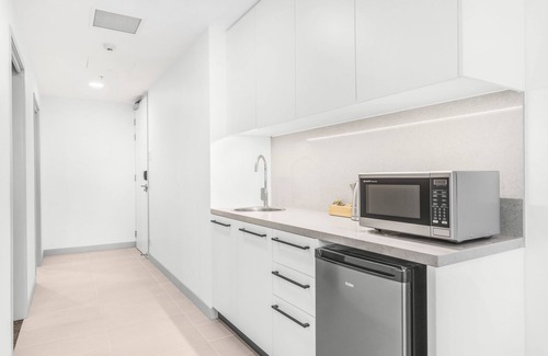 Taringa Hotel | Essence Suites Taringa
