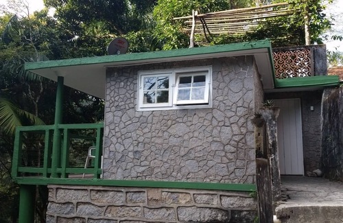 Itatiaia Ski Chalet | Estalagem do Rancho: Chalet with waterfalls