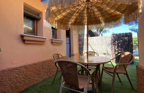 El Palmar Apartment | Estudio con jardincito privado barbacoa y piscina