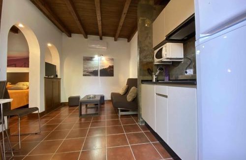 El Palmar Apartment | Estudio con jardincito privado barbacoa y piscina