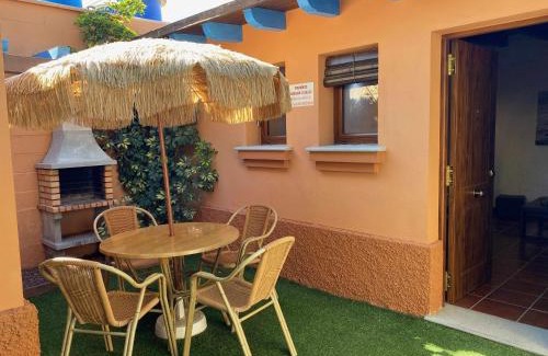 El Palmar Apartment | Estudio con jardincito privado barbacoa y piscina