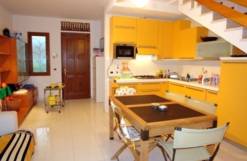 Lignano Pineta Villa | Excellently equipped row house with fenced garden for 8 in Lignano Pineta