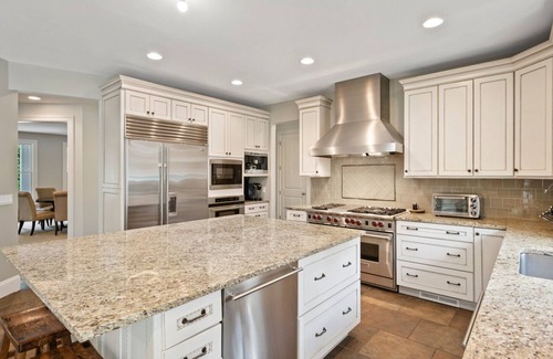Wainscott Woods House | Exceptional shingle-style home sited on just under an acre of land,.