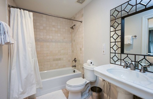 Wainscott Woods House | Exceptional shingle-style home sited on just under an acre of land,.