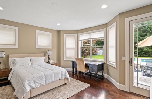 Wainscott Woods House | Exceptional shingle-style home sited on just under an acre of land,.