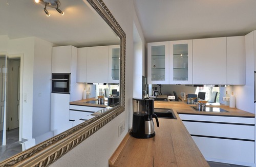 Dassow Apartment | Exclusive apartment Peter Pan in a thatched cottage with sea views, sauna and wireless internet