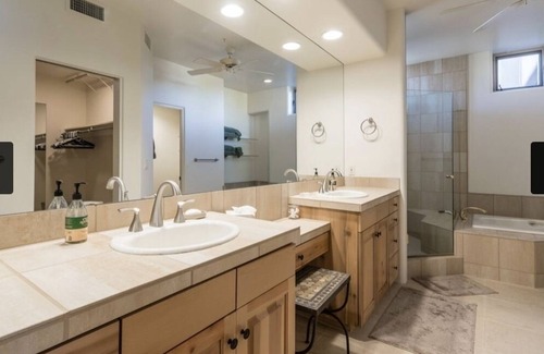 Desert Mountain House | Exclusive Desert Mountain, Scottsdale Double Master Suite with fireplace.