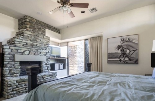 Desert Mountain House | Exclusive Desert Mountain, Scottsdale Double Master Suite with fireplace.