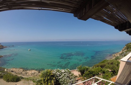 Alghero Apartment | Exclusive penthouse overlooking the sea . with deserted beach under the house.