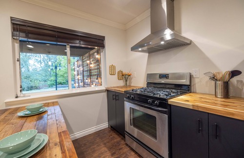 Walnut Grove House | Executive 3 bedroom suite with theater room & hot tub on a park-like property.