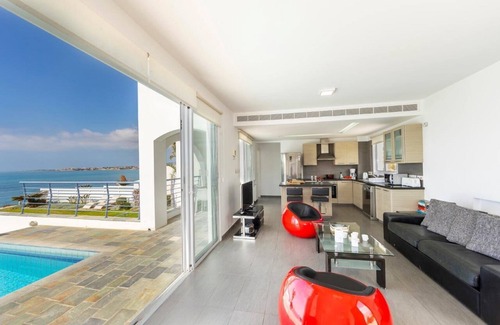 Kissonerga Villa | Executive Waterfront Villa with large pool, Spectacular Sunsets and Sea Views
