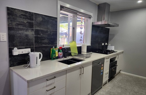 Titirangi House | Experience Comfort in Our 3-Bedroom Family Home