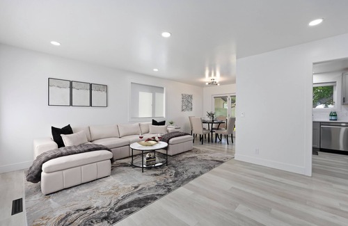 Burley House | Experience elevated comfort in this thoughtfully designed retreat. Featuring two inviting bedrooms, a fully equipped kitchen, and serene details, it blends simplicity with style for a clean, welcoming stay.