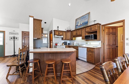 Spring Lake House | Experience lakeside luxury at Sunset Cove, a spacious 5-bedroom home
