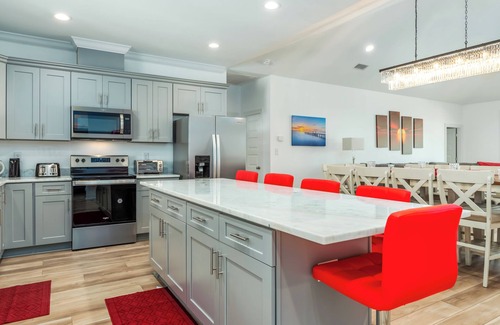 Dauphin Island House | Experience Luxury at Wine n' Sea: Pet-Friendly Waterfront Home with Private Pool