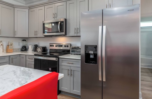 Dauphin Island House | Experience Luxury at Wine n' Sea: Pet-Friendly Waterfront Home with Private Pool