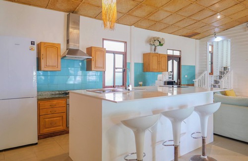 Taling Ngam Villa | Experience serene sunsets, private beach access, and tropical luxury in this renovated Thai house.