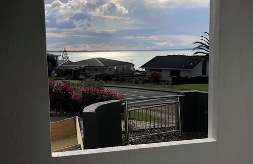 Maraetai Apartment | Experience spectacular elevated sea views and relax on white sandy beaches.