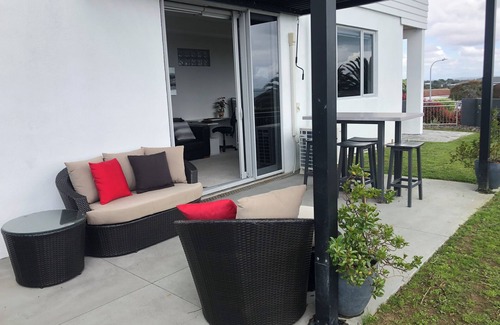 Maraetai Apartment | Experience spectacular elevated sea views and relax on white sandy beaches.