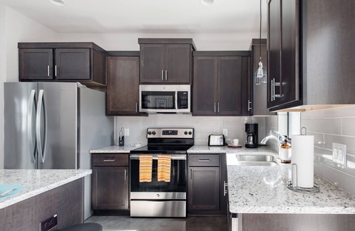 Eastside Promise Neighborhood House | Explore the River Walk from Artsy Designer Retro Chic Home