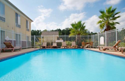 New Llano Hotel | Express Inn Leesville Ft Johnson, SureStay Collection by Best Western