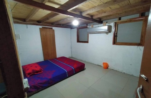 Painan Hotel | EXPRESS O 91702 Mandeh Homestay Syariah Near Bank Nagari PT Bank Pembangunan Daerah (BPD) Sumbar Cabang Painan
