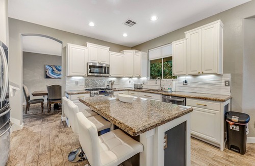 Terramar House | Exquisite home with firepit, game room, heated pool, pool spa, & putting green