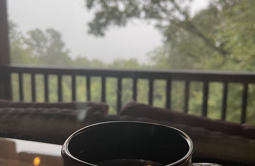 Cobden Cabin | Exquisite views of Shawnee National Forest seen from a private, covered hot tub.