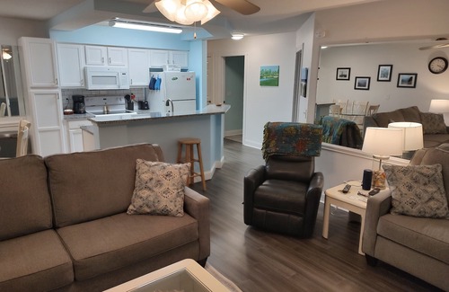 Sunset Beach Condo | Extra large first floor condo with indoor & outdoor pools, close to the beach.