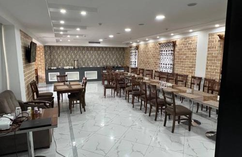 Kyzyltepa District House | Ezella