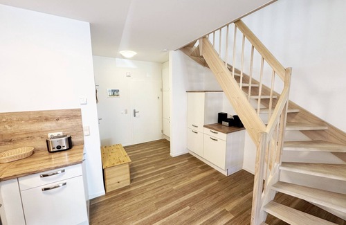 Thiessow Apartment | F: Haus Düne Whg. 03 with fireplace & south/west terrace & balcony - Haus Düne Whg. 03